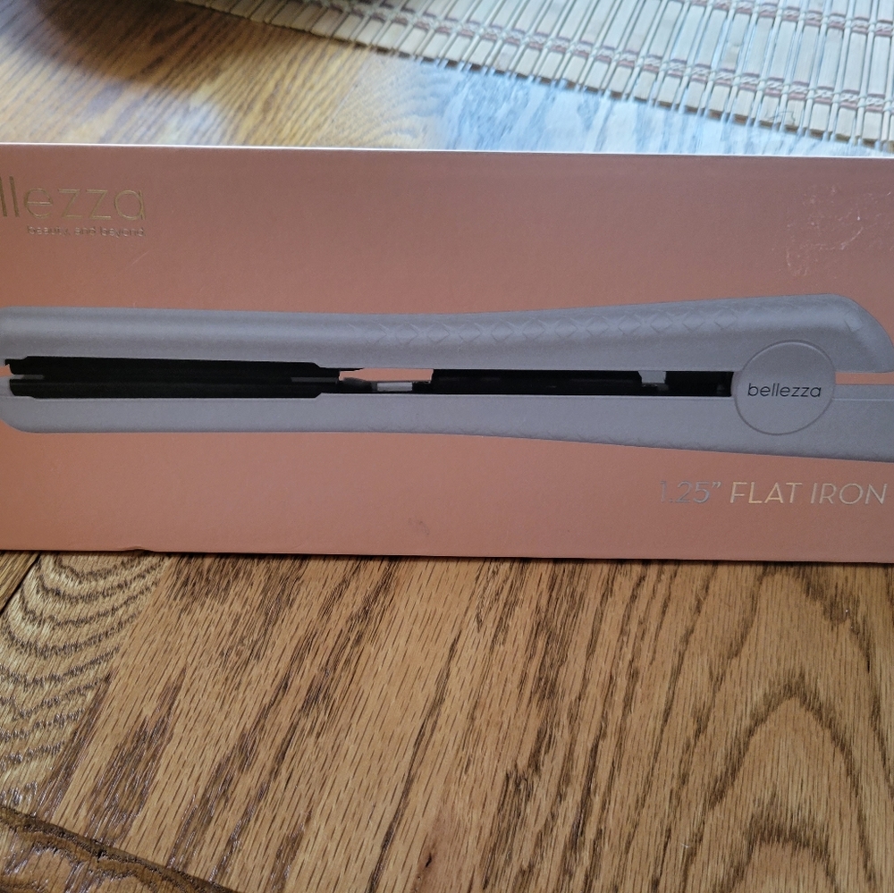 1.25" flat iron brand new in box